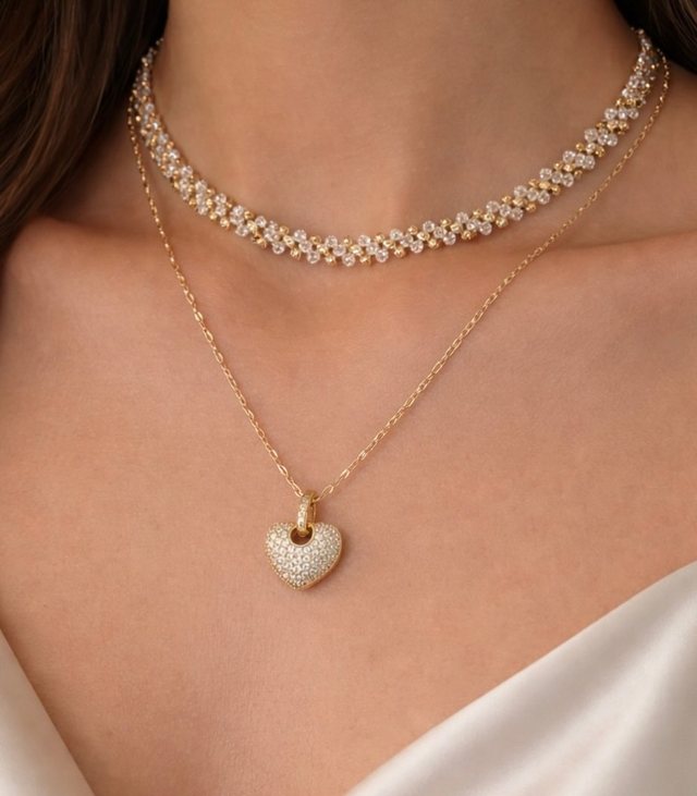 Pavé collar necklace layered with a fine chain and heart pendant